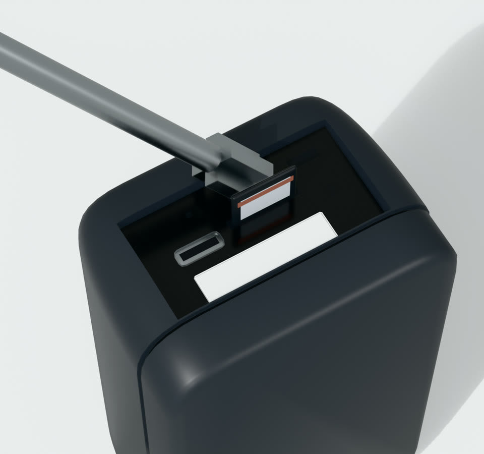 Back of the camera: screwdriver tip on POWER, memory card at the slot