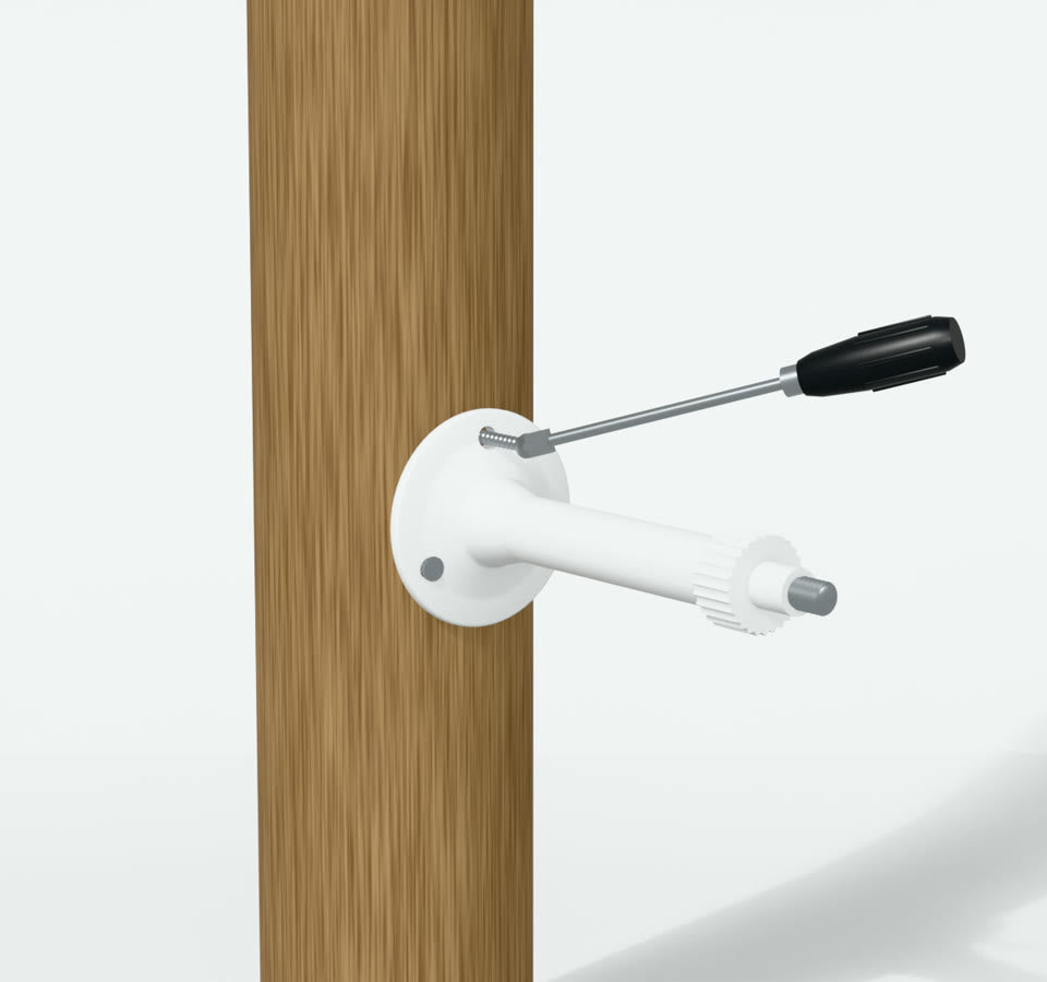 White arm foot on a wooden post, long screws being driven in