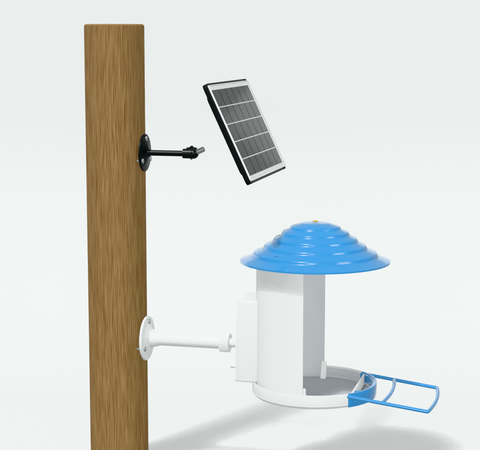 Black stand on the post, solar panel about to go onto its tip